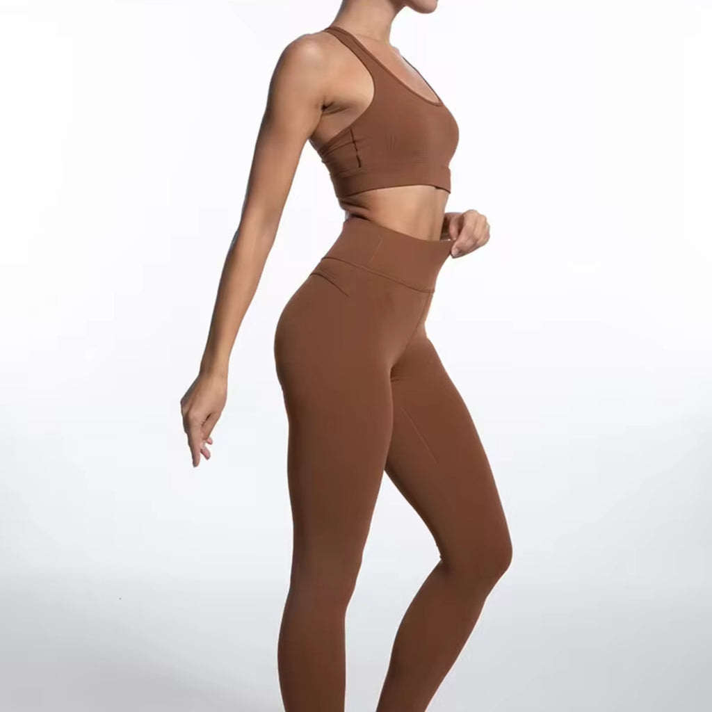 Side view of brown women's gym wear set – high-waist leggings and top